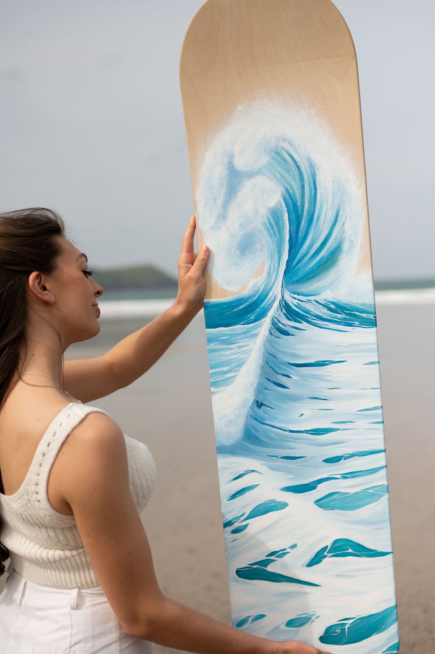 wave painting on wooden bellyboard by cornish artist, Phoebe Pocock.